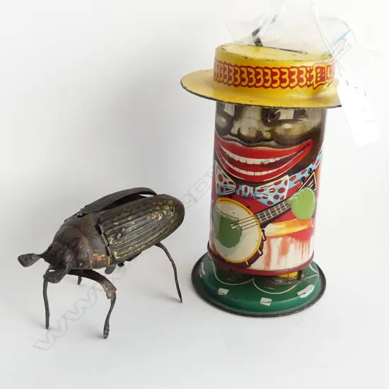 2 VINTAGE TIN TOYS; MINSTREL TIN BANK (ENGLAND) H.140mm + ANTIQUE CARL ADAM WIND UP BEETLE (LEG BROKEN)