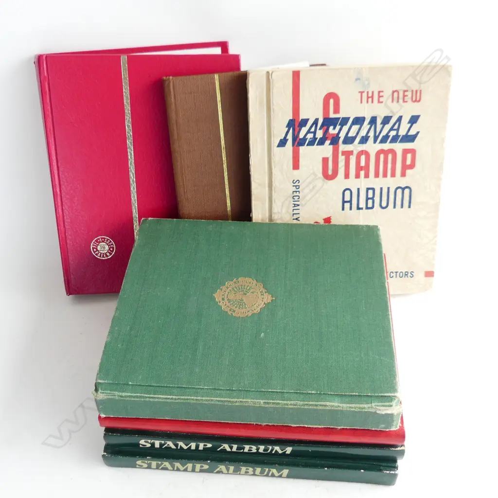 7 SMALL ALBUMS OF NZ & WORLD STAMPS H.210mm Image 1++