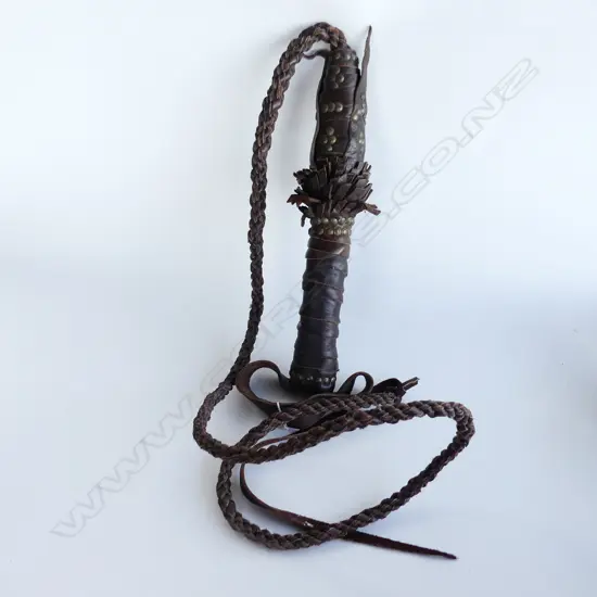 BROWN LEATHER WHIP