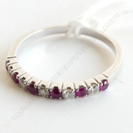 18CT WHITE GOLD DIAMOND & RUBY FLAT BAND RING 2.2GMS  WITH VALUATION 