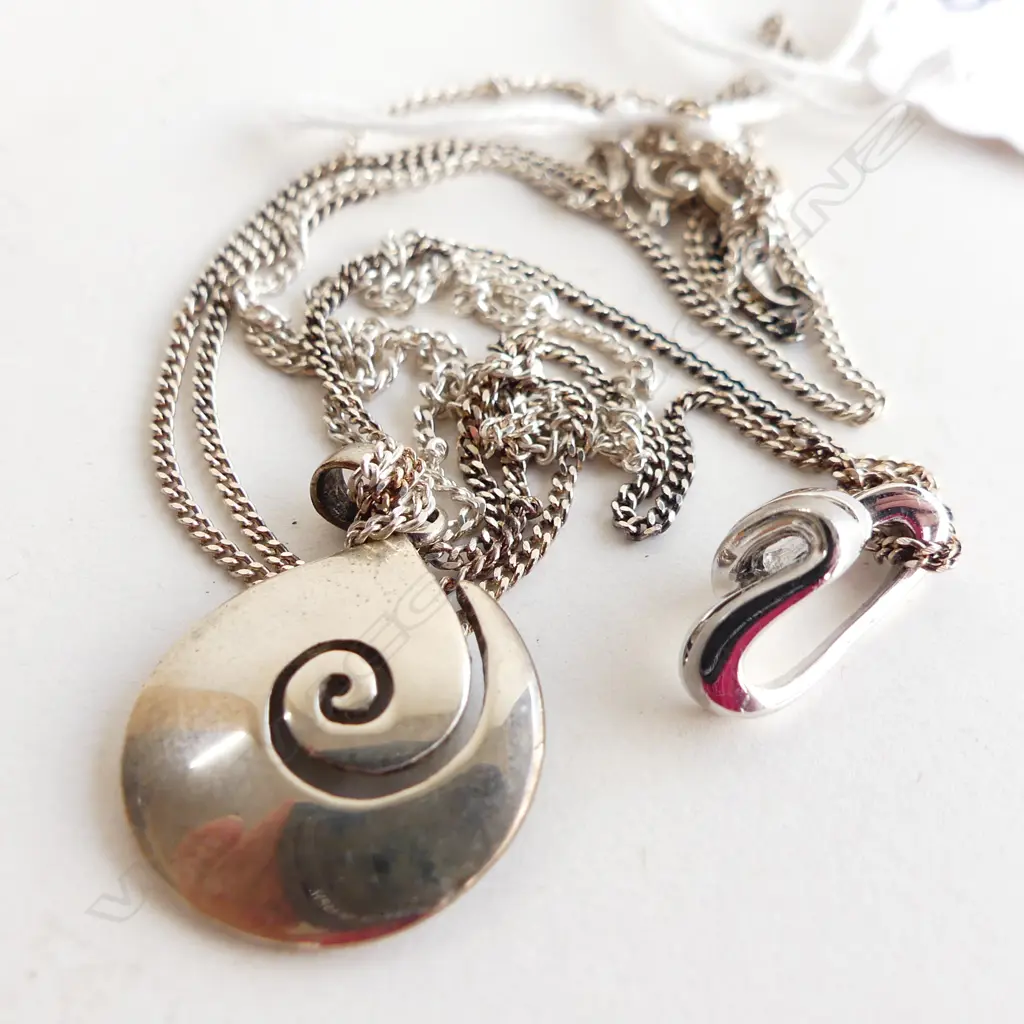 2 SILVER PENDANTS ON CHAINS INCL ONE KORU SHAPE Image 1++
