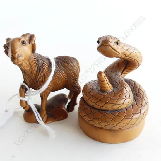 2 CARVED WOODEN JAPANESE NETSUKE; GOAT & RATTLE SNAKE H.50mm