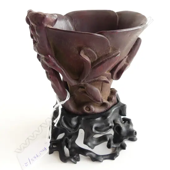 CHINESE CARVED BAMBOO / WOODEN? LIBATION CUP ON EBONISED STAND