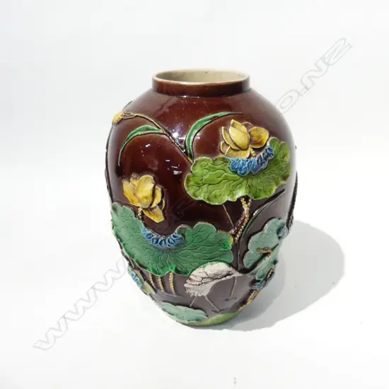 ORIENTAL OVOID VASE; LOTUS FLOWERS ON BROWN GROUND H.