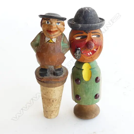 TWO ANRI BOTTLE STOPPERS - MAN WITH FLY ON FACE & MAN IN APRON L. 95MM