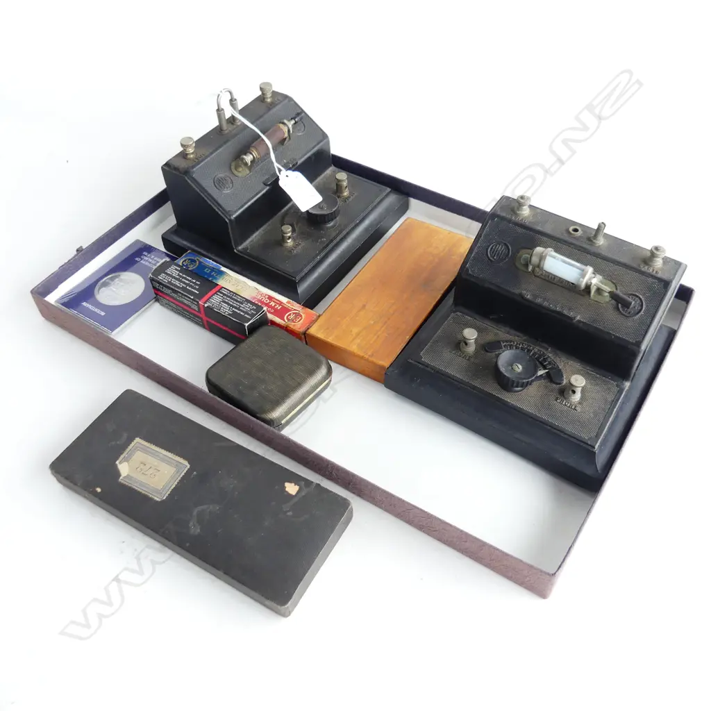 2 ANTIQUE ELECTRIC CURRENT METERS + BOXED DRAWING SETS + PENS, 2 COMMEMORATIVE COINS, JAMES COOK. etc Image 1++