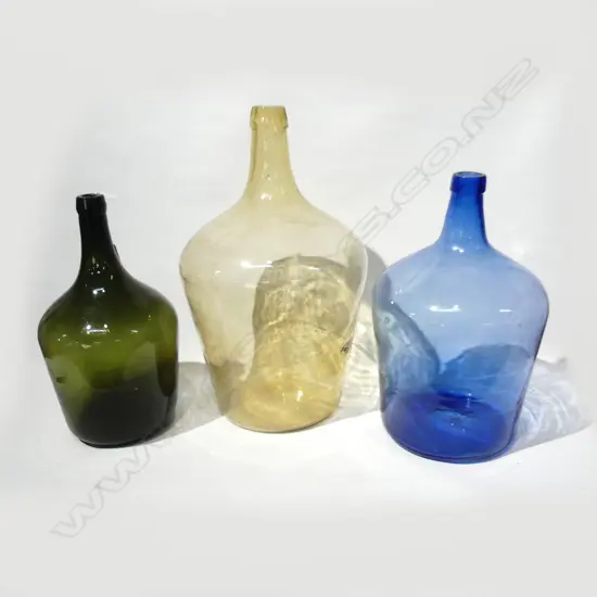 3 LG COLOURED GLASS BOTTLES; BLUE (H430MM) GREEN (H390MM) AMBER (H520MM)