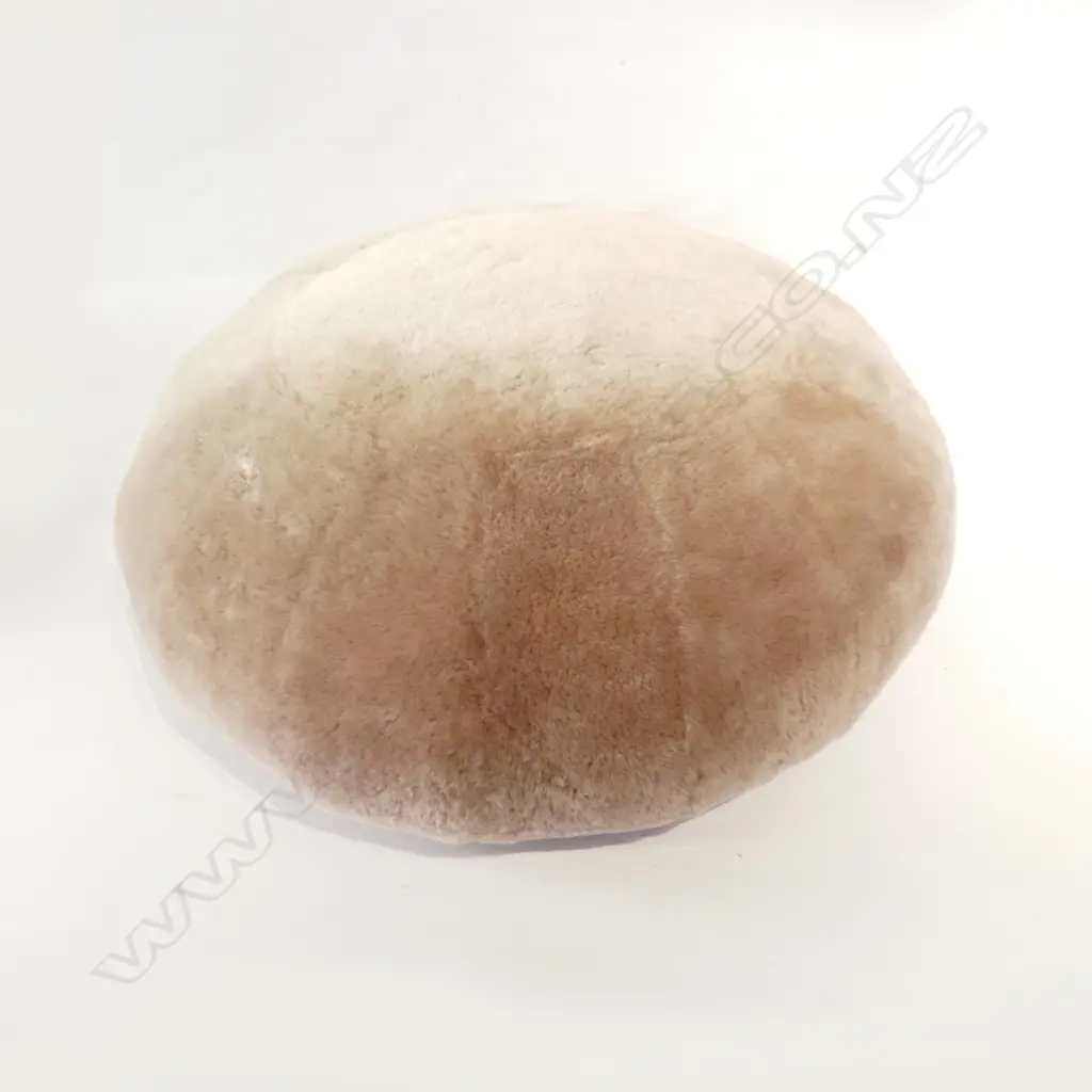 PALE PINK SHEEPSKIN OTTOMAN; 'FIBRE BY AUSKIN' 600mm dia (SOME FADING) Image 1++