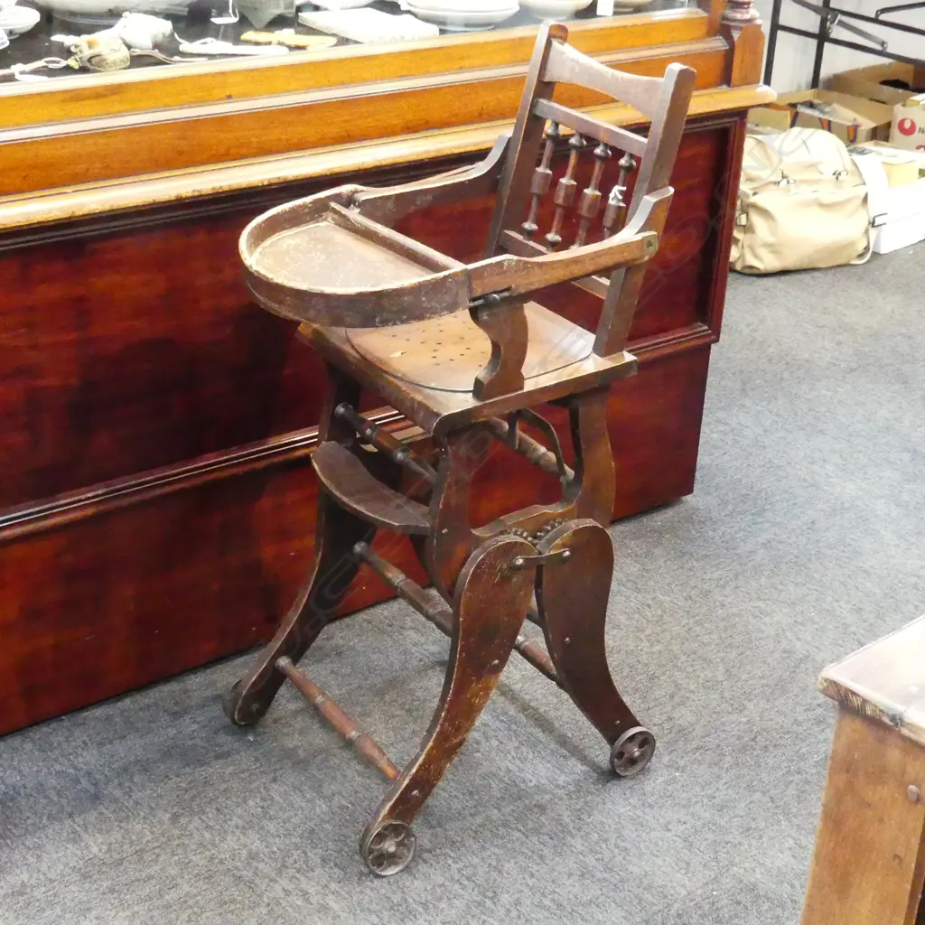 VICTORIAN METAMORPHIC HIGHCHAIR. FOLDING  TO BECOME ROCKER. TURNED VERTICAL RAILS. SOME OLD BORER DAMAGE. H. 930mm Image 1++