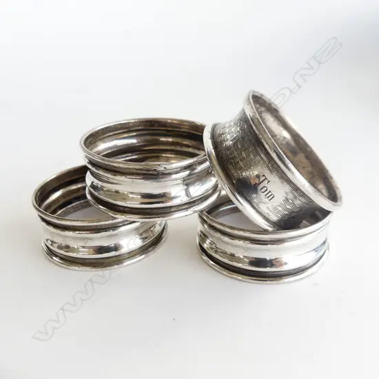 4 SILVER NAPKIN RINGS