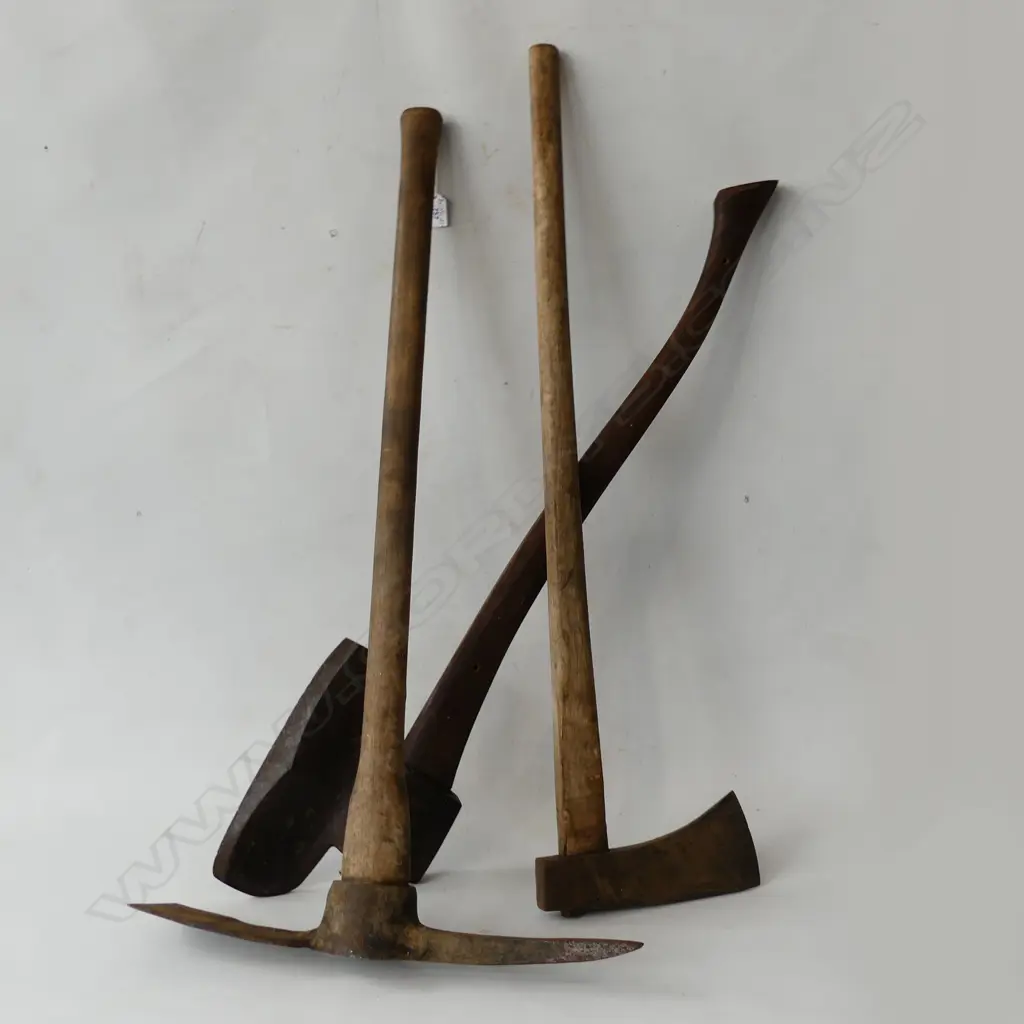 THREE LONG HANDLED TOOLS. TWO AXES AND A GRUBBER. Image 1++