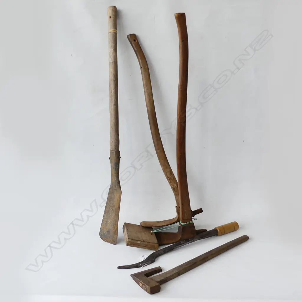 FIVE LONG HANDLED TOOLS. TWO GRUBBERS A TWO SLASHERS & AN AXE. Image 1++