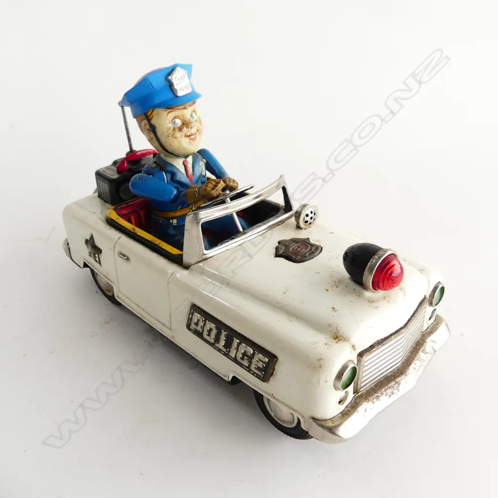 JAPANESE TIN PLATE POLICE CAR - MADE IN JAPAN BY NOMURA, C1950'S. BATTERY OPERATED L. 240MM Image 1++