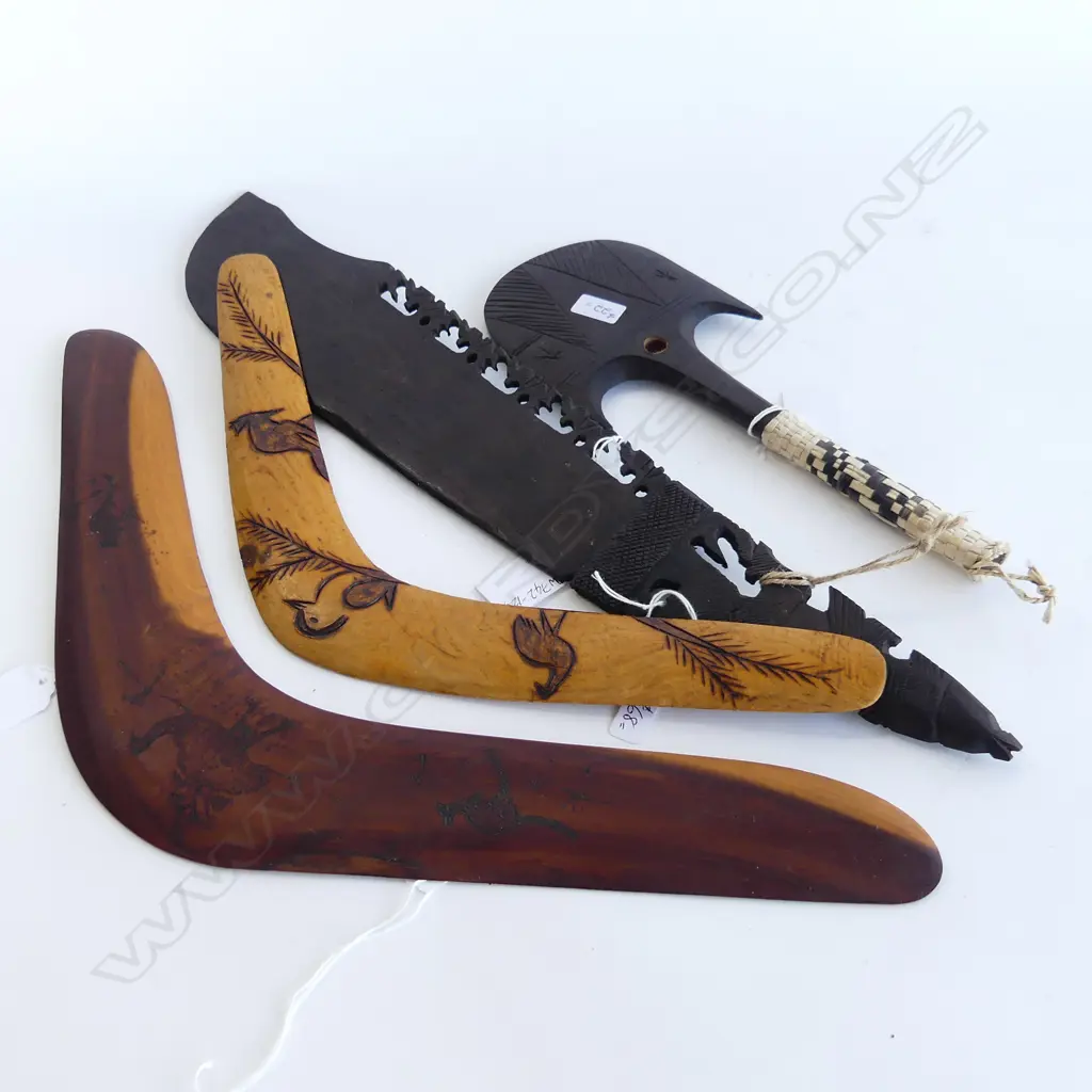 FOUR WOODEN ITEMS. TWO BOOMERANG A MINIATURE AXE CLUB & EBONY CARVED MACHETE. Image 1++
