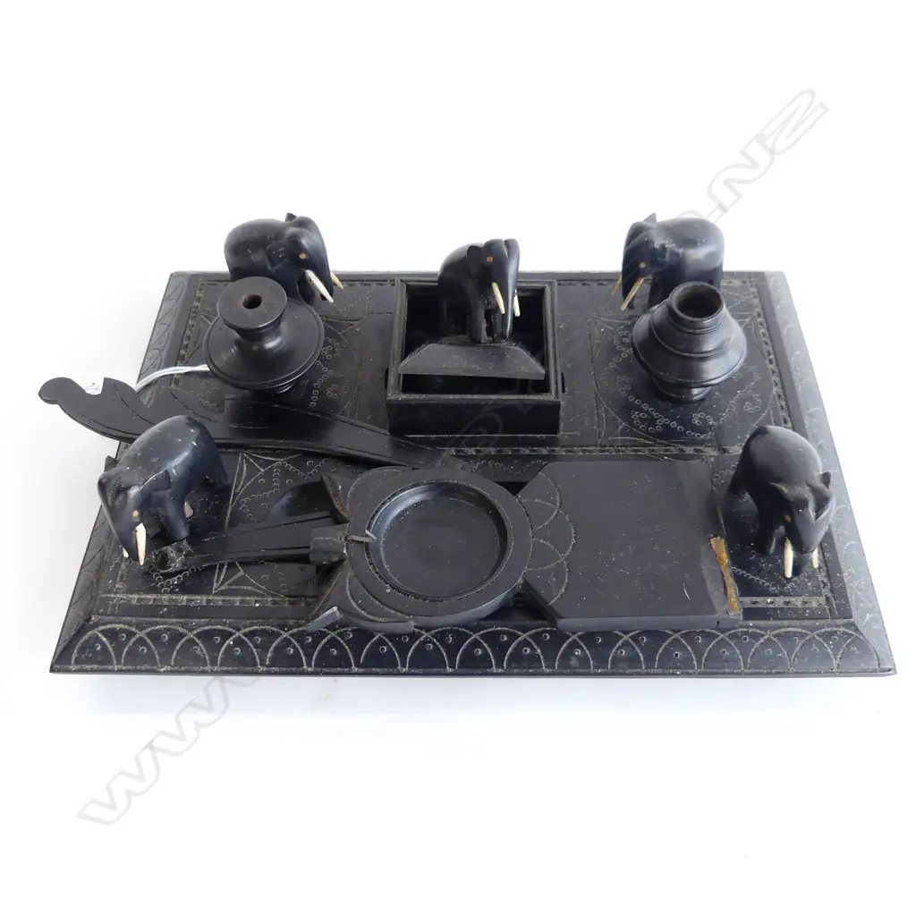 EBONY DESKSET WITH FIVE CARVED ELEPHANTS. NEEDS SOME RECONSTRUCTION. Image 1++