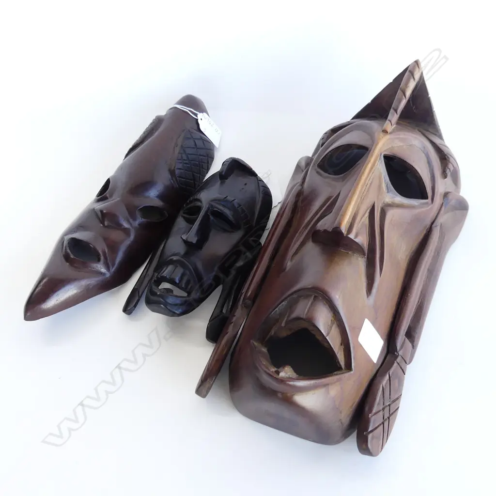 THREE AFRICAN CARVED MASKS. ONE EBONY .H. 380.280.170mm Image 1++