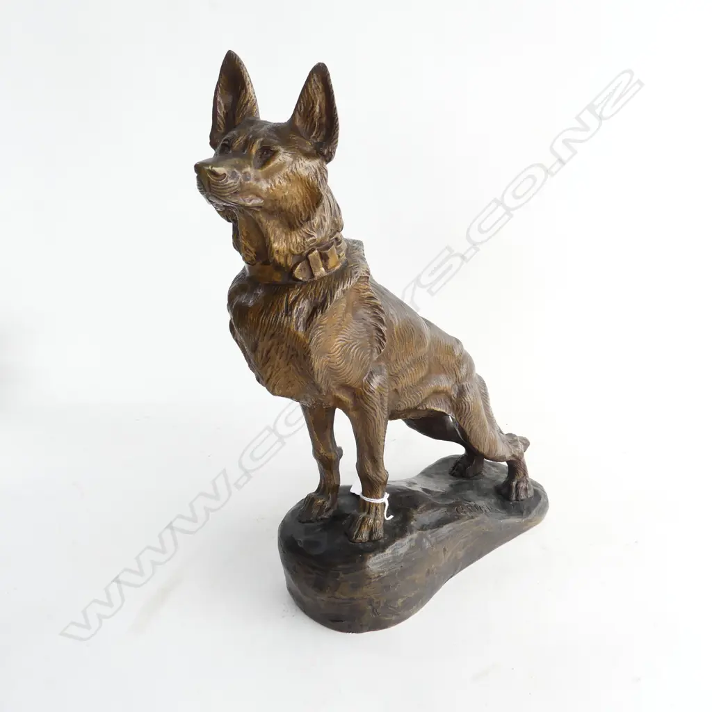 A French bronze figure of a standing Alsatian dog on rocky outcrop Image 1++