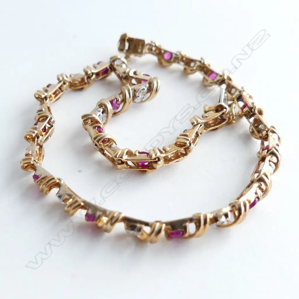9CT GOLD DIAMOND AND RUBY TENNIS BRACELET 5.68gm Image 1++