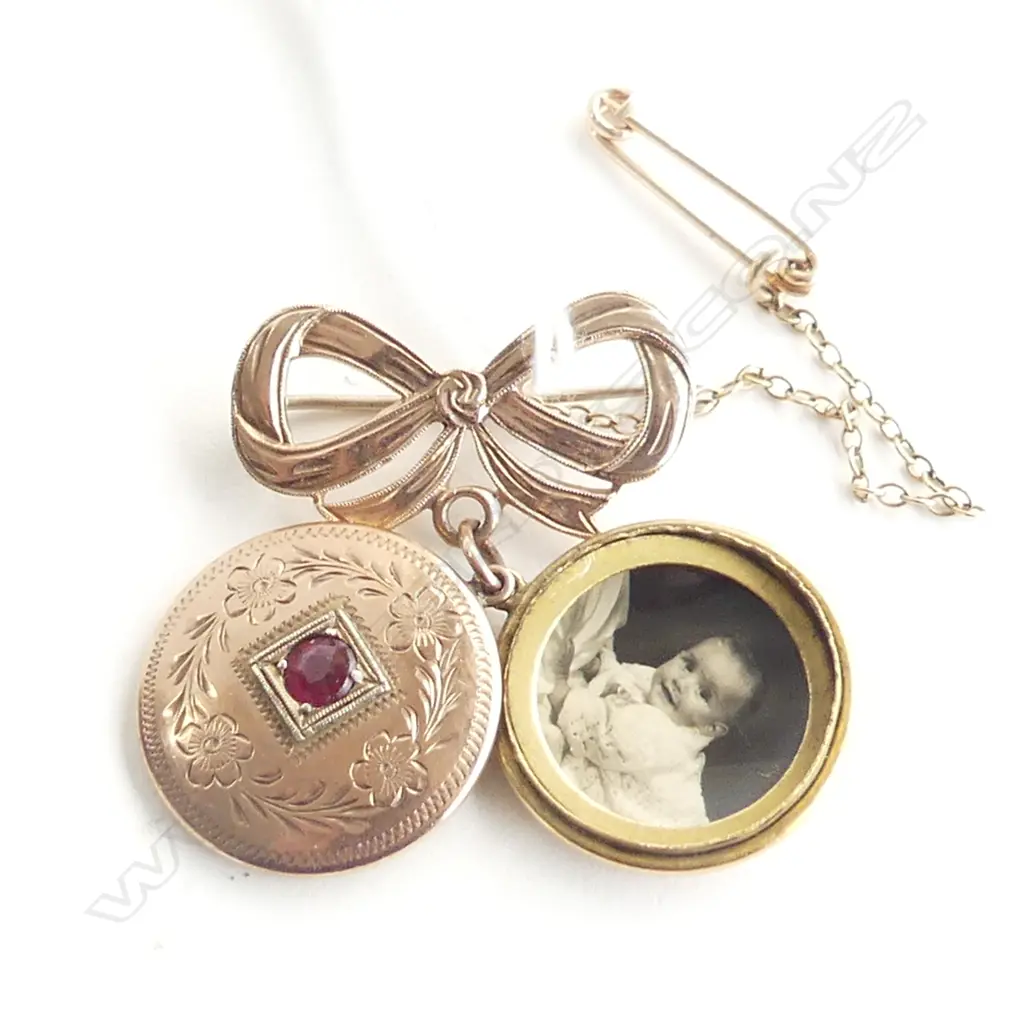9CT ROSE GOLD LOCKET ON BOW BROOCH 8.1gms Image 1++