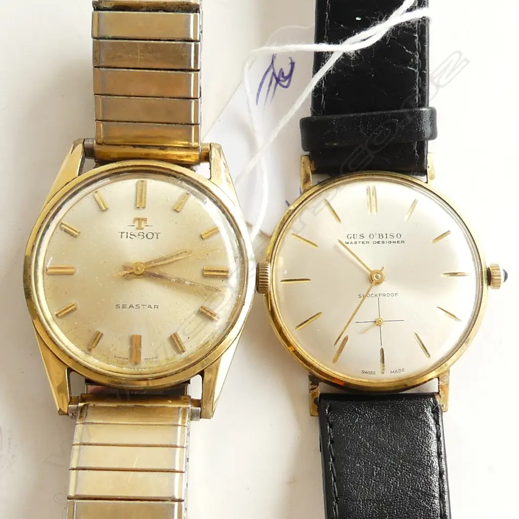 TWO MENS  MANUAL WIND 1960S WATCHES. TISSOT AND GUS OBISO. GOLD PLATED BOTH APPARENTLY WORKING. Image 1++