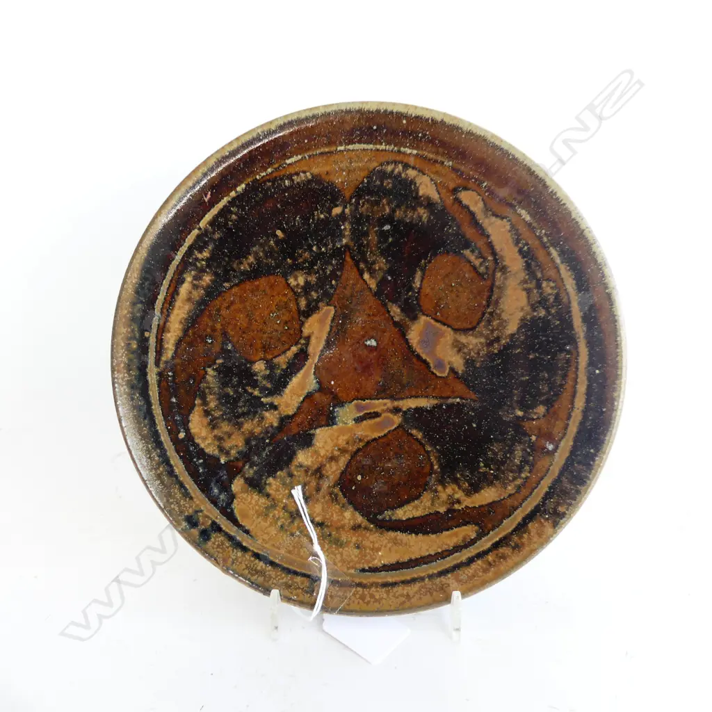 GRAEME STORM TENMOKU PLATE, IMPRESSED MARK TO BASE, DIA 218MM Image 1++