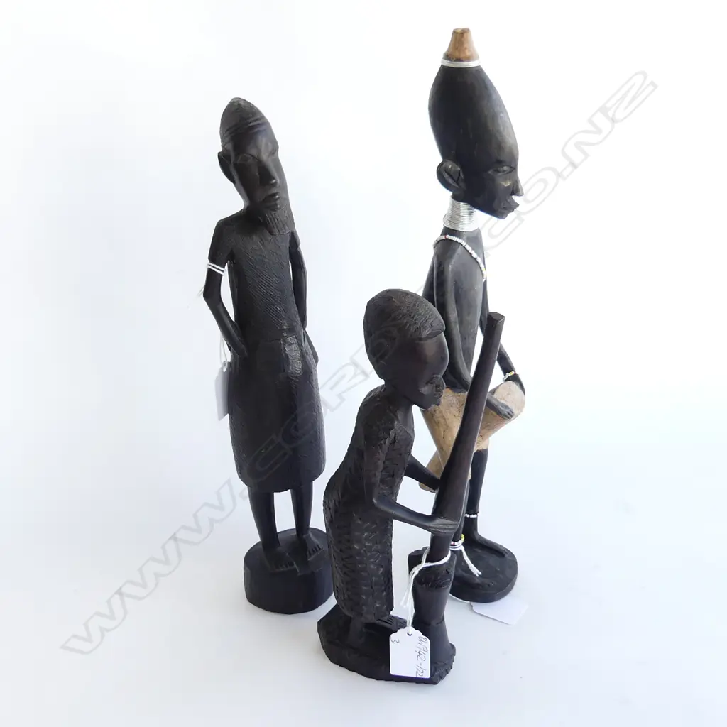 THREE AFRICAN EBONY FIGURES. ONE DRUMMER H. 370mm ONE POUNDING H. 250mm  OTHER WISEMAN H.340mm Image 1++