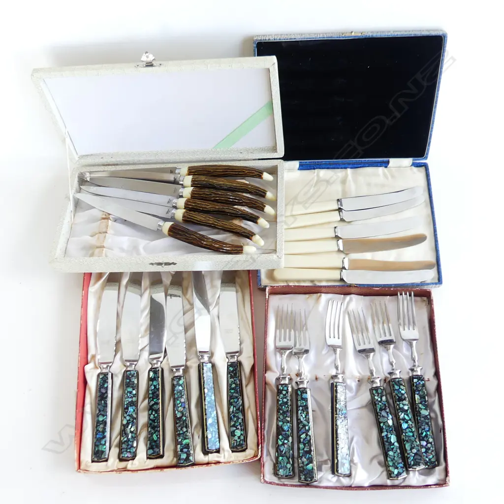 FOUR SETS OF BOXED CUTLERY. FORKS &KNIVES WITHN PAUA GRIPS BUTTER KNIVES AND ' ANTLER' STEAKKNIVES.  Image 1++