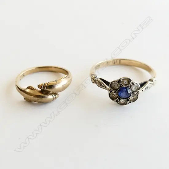 2 9CT RINGS; BLUE & WHITE STONES / DOLPHINS 2.8 GRAMS