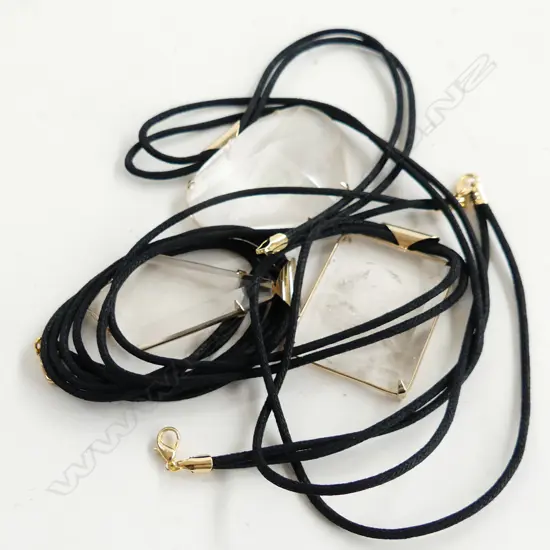 3 MOUNTAIN CRYSTAL PENDANTS ON BLACK CORD 