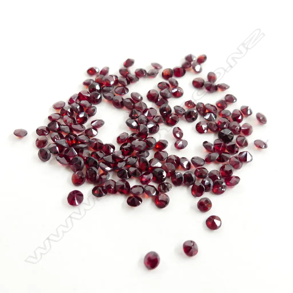 BAG 15CT FACETED GARNETS  Image 1++