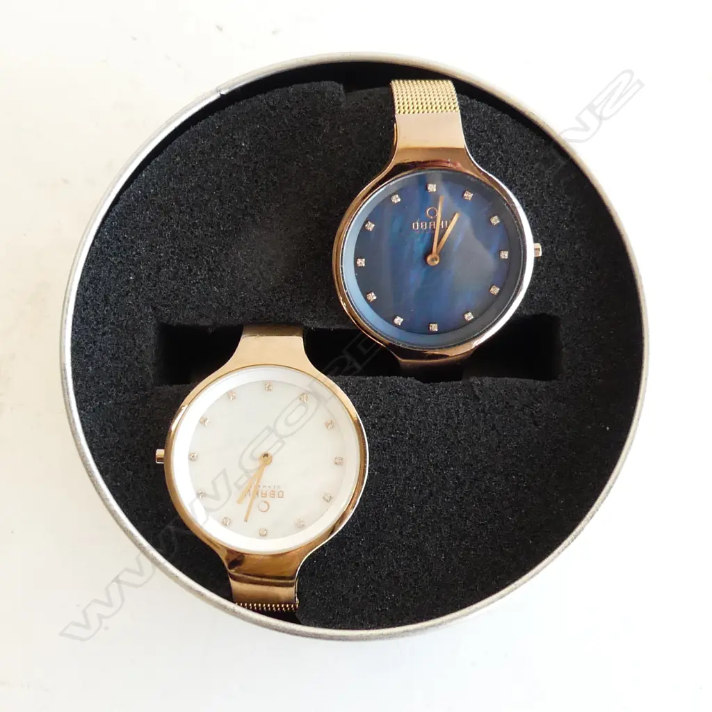 PR BOXED OBAKU (DENMARK) DESIGNER WATCHES; 1 WITH MOP FACE, 1 BLUE IRIDESCENT - IN BOX Image 1++