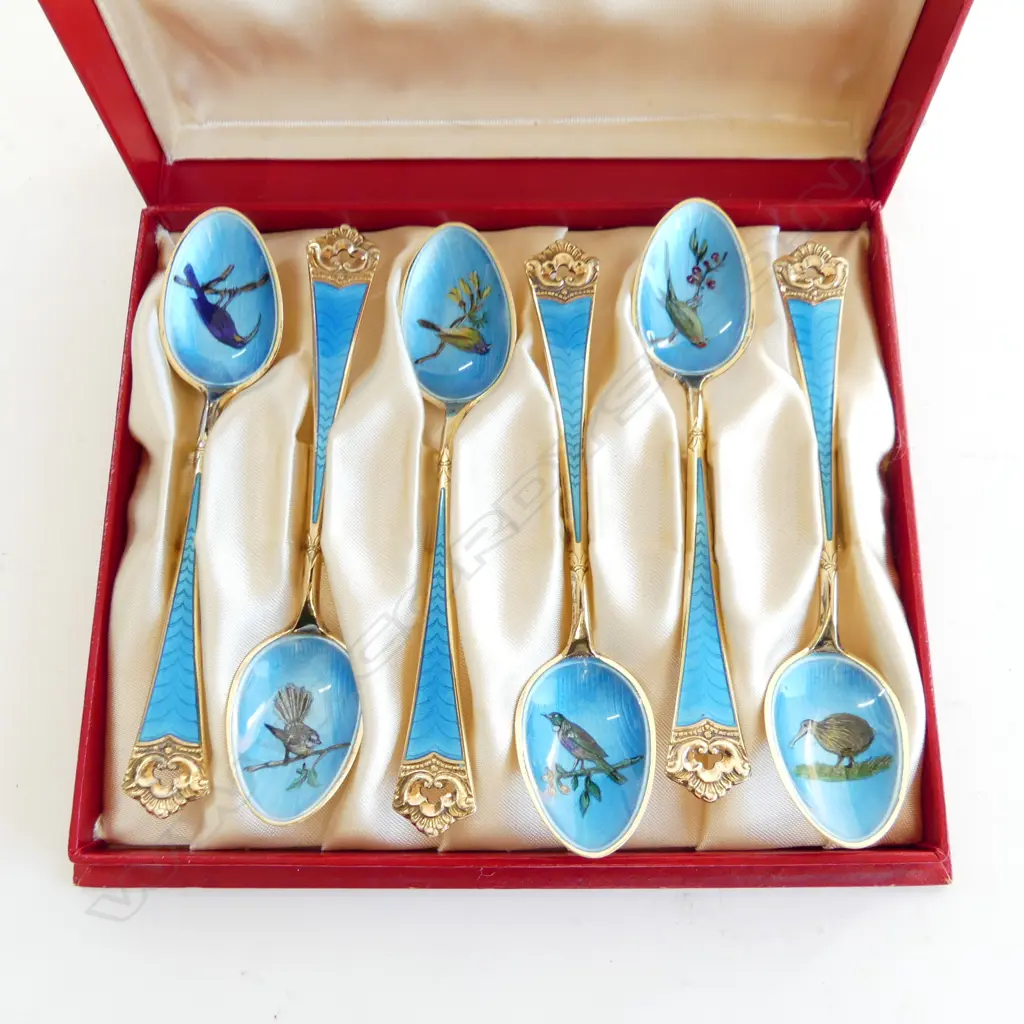BOX OF NORWEGIAN SILVER GILT AND ENAMEL SPOONS (NZ BIRDS) Image 1++