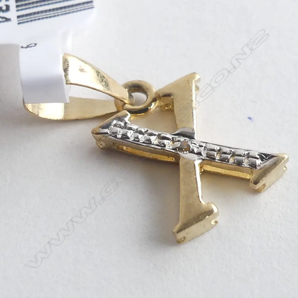 9CT GOLD & DIAMOND LETTER 'X' 0.5 GRAMS Image 1++