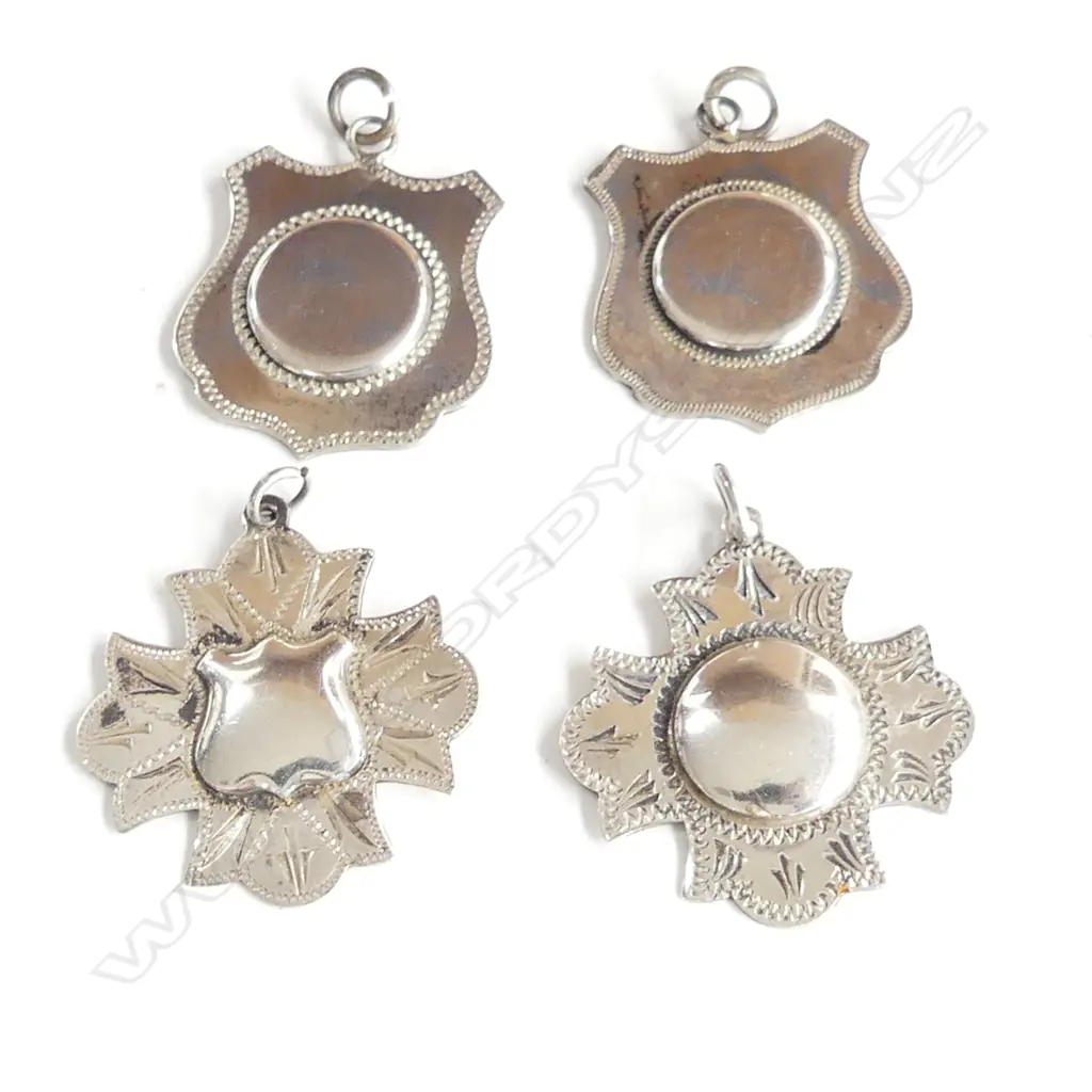   4  STERLING SILVER MEDALETTES.  Image 1++
