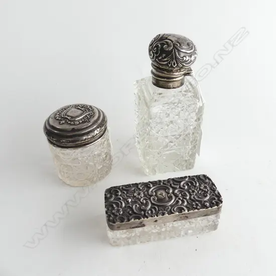 THREE STERLING SILVER TOPPED DRESSING SET ITEMS. ALL BIRMINGHAM MADE. BOTTLES H.115 ( DENTED ) & 60MM . W. (TRAY) 83mm