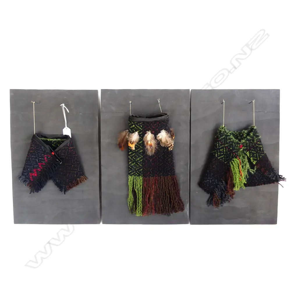 SANDRA TYLER; 3 KITTED WOOLLEN MAORI PCES; 2 CLOAKS + KETE ON BLACK PAINTED BOARD EACH 450x290mm Image 1++