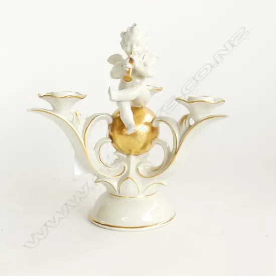 GERMAN PORCELAIN CANDELABRA OF CHERUB SITTING ON GOLDEN BALL H. 240mm