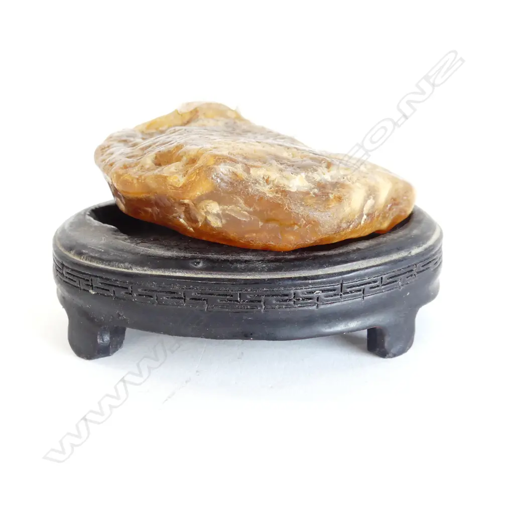 POLISHED STONE ON SHAPED EBONISED STAND W.100mm Image 1++