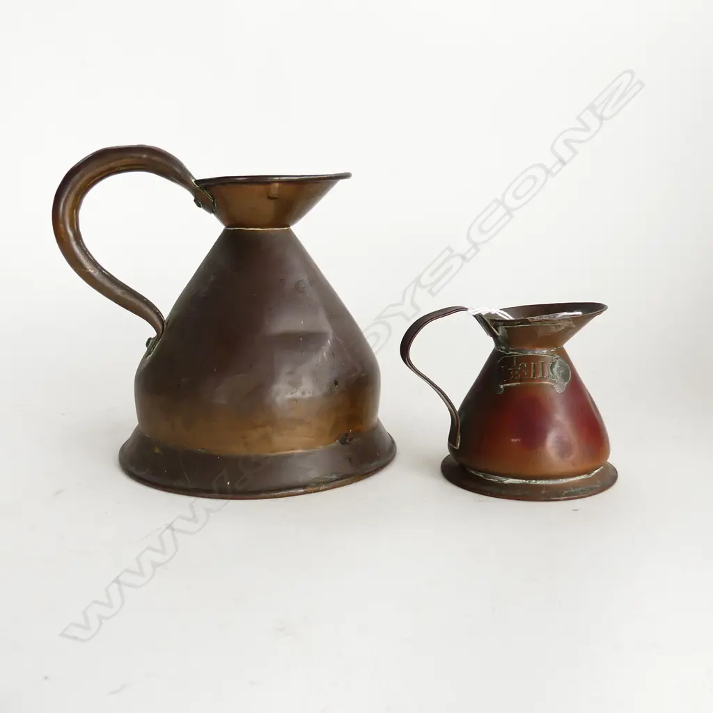 TWO VICTORIAN COPPER MEASURING JUGS STAMPED FOR 1 ½ GILLS AND 2 PINTS H. 180mm H. 90mm Image 1++