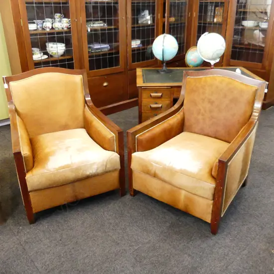 PR HIDE COVERED ARMCHAIRS, MAHOGANY FRAME...