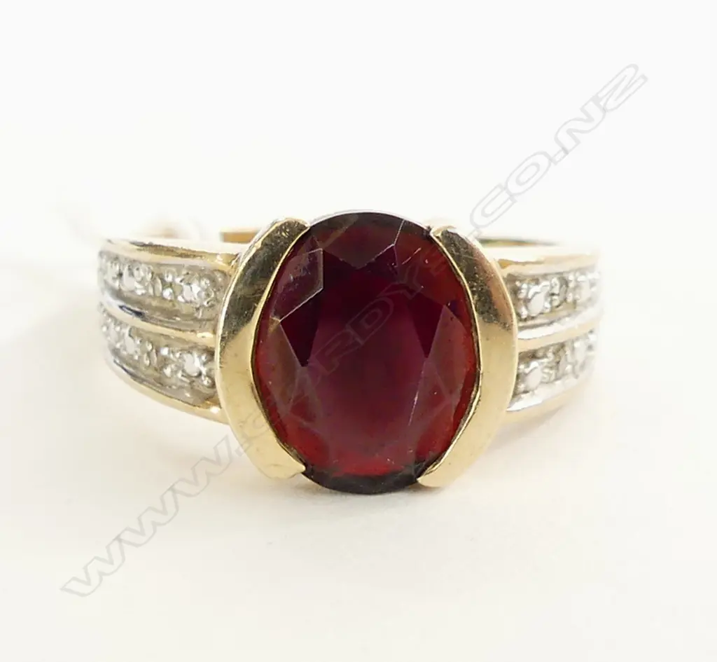  9CT GOLD GARNET RING WITH 4 SMALL DIAMONDS 5GMS Image 1++