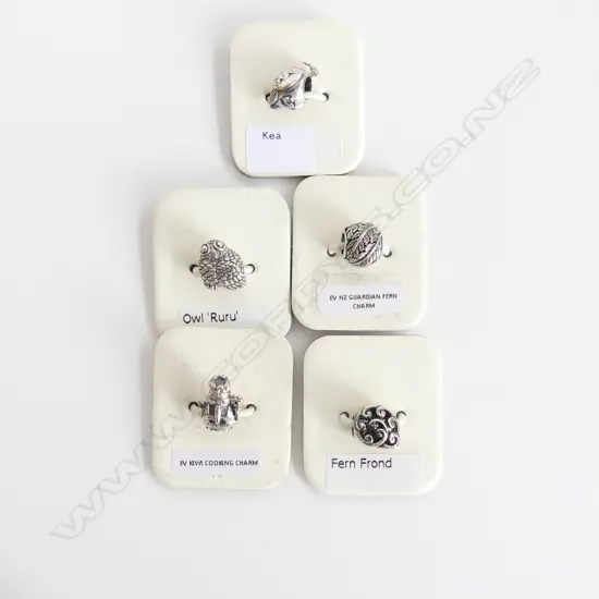 5 STG SILVER CHARMS; KEA, FERN FROND, NZ GUARDIAN FERN, OWL (RURU) & COOKING CHARM