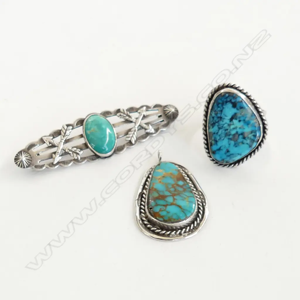 STG SILVER AND TURQUOISE RING SZ T 1/2, PENDANT AND NAVAHOE BROOCH. Image 1++