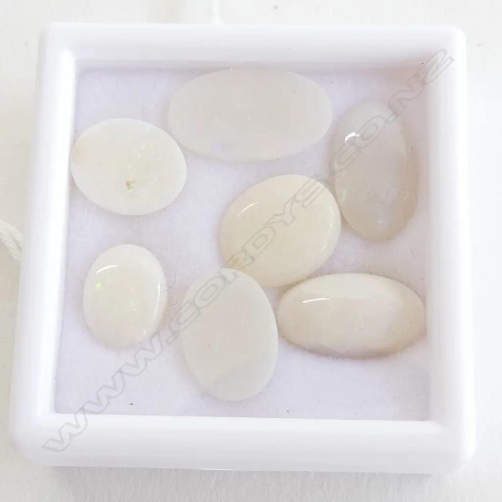 SEVEN 15CT OVAL MILKY OPALS Image 1++