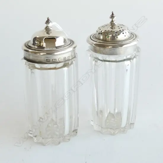  2 large Stg topped cut glass mustard and pepper.Sheffield 1874.