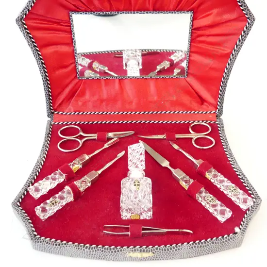 GERMAN MANICURE SET WITH CRYSTAL GRIPS AND A MATCHING PERFUME BOTTLE.