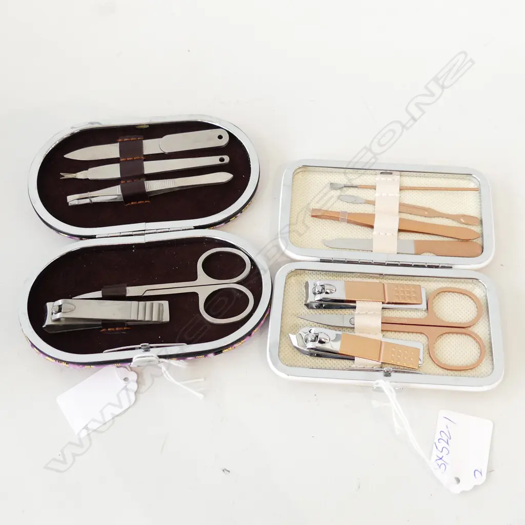 TWO BOXED MANICURE SETS. ONE PINK/GOLD  Image 1++