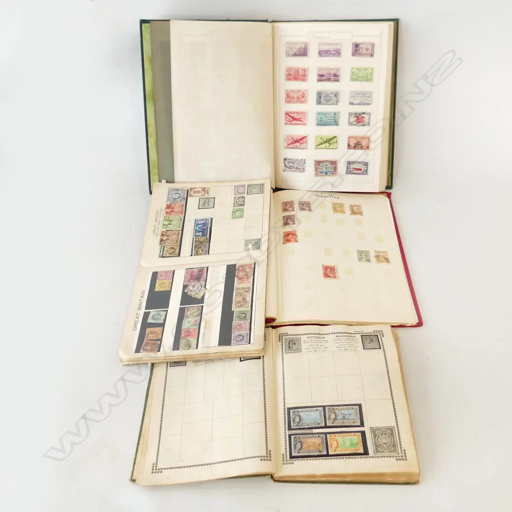 4 VINTAGE WORLD STAMP ALBUMS Image 1++