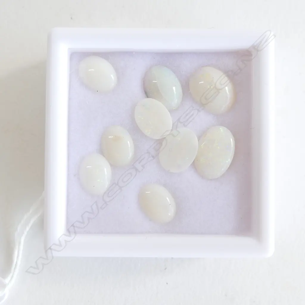 NINE 5CT OVAL MILKY OPALS  Image 1++