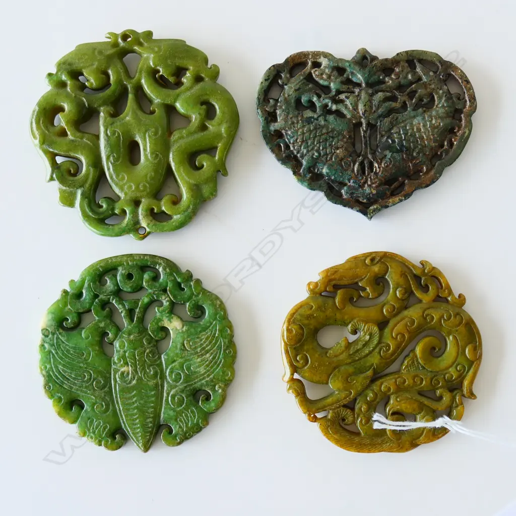 FOUR JADE / JADEITE AMULETS Image 1++
